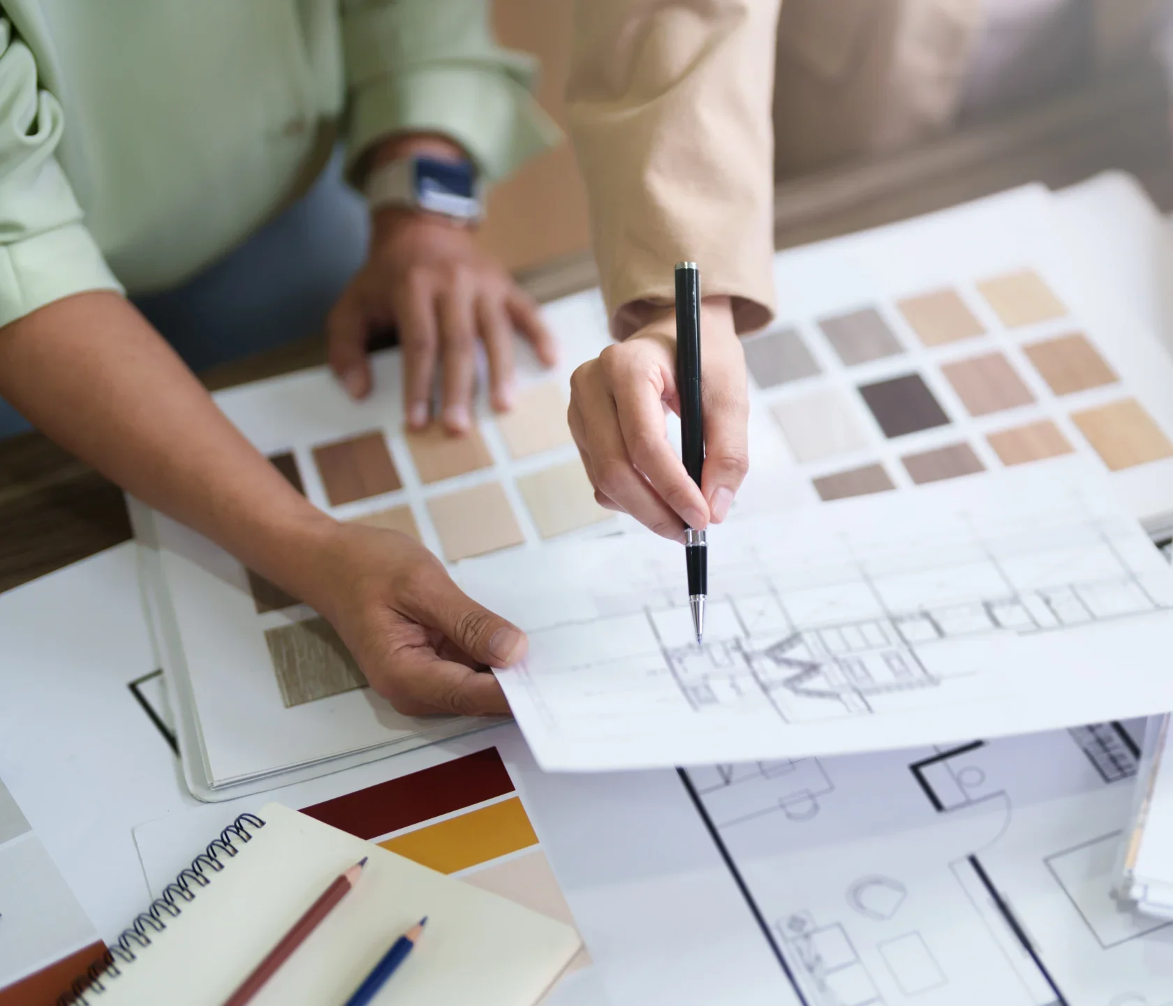 Contractor and designer working on home construction renovation project